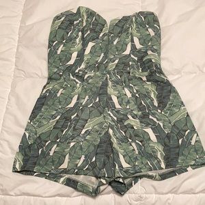 Green and white banana leaf romper